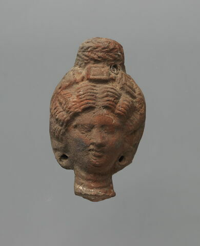figurine de tête de femme romaine à cou fermé