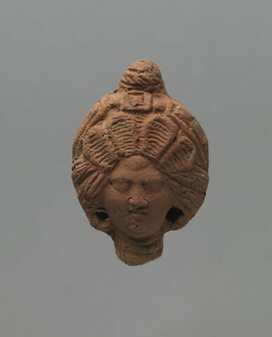 figurine de tête de femme romaine à cou fermé