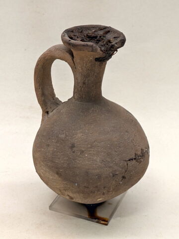 flacon ballon à anse ; avec contenu