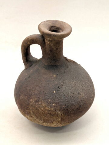 flacon ballon à anse ; avec contenu