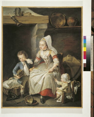 Une Mère (en costume de Cauchoise) dans sa cuisine avec deux de ses enfants, image 2/2