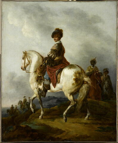 Cavalier sur un cheval blanc