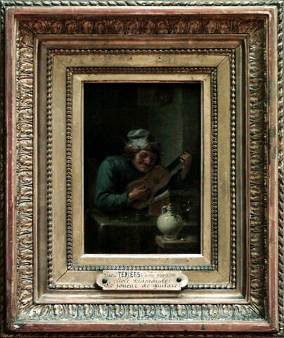 Le joueur de guitare, épié d'en haut, image 3/4