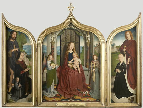 Triptyque de la famille Sedano : volet droit : Marie, épouse de Jean de Sedano, en prière avec saint Jean l'Évangéliste ; face externe : Ève, nue, image 2/11