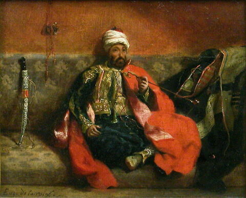 Turc fumant, assis sur un divan, image 3/3