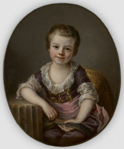Portrait d'enfant jouant de la guitare