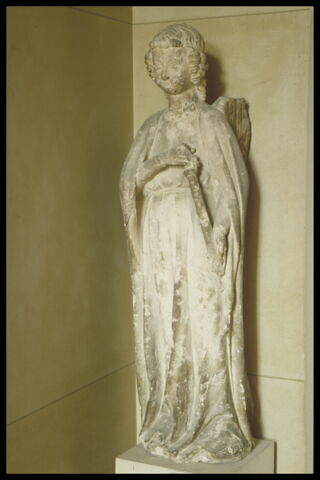 Ange soufflant dans une trompe, image 9/11