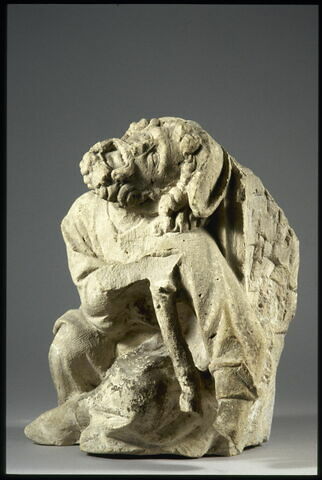 Homme appuyé sur une béquille, image 8/13