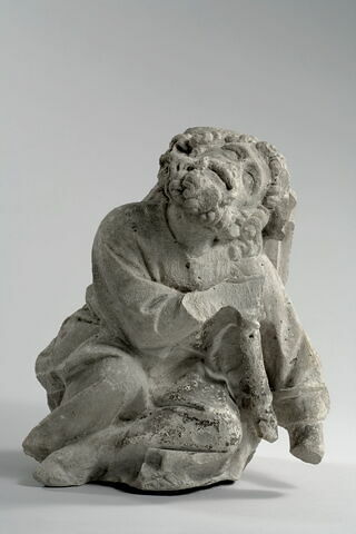 Homme appuyé sur une béquille, image 2/13