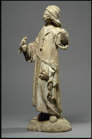 Personnage portant un faucon sur le poing, image 4/8