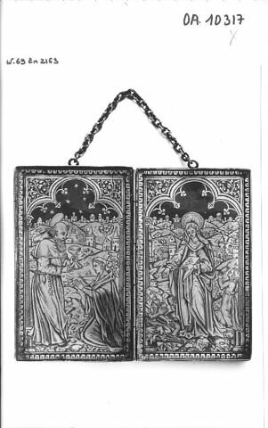 Diptyque de cuivre doré et ciselé d'arabesques