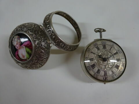 Montre ronde à double boîtier
