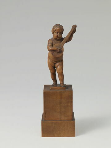 Statuette : enfant jouant du luth