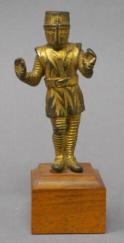 Statuette : guerrier à heaume