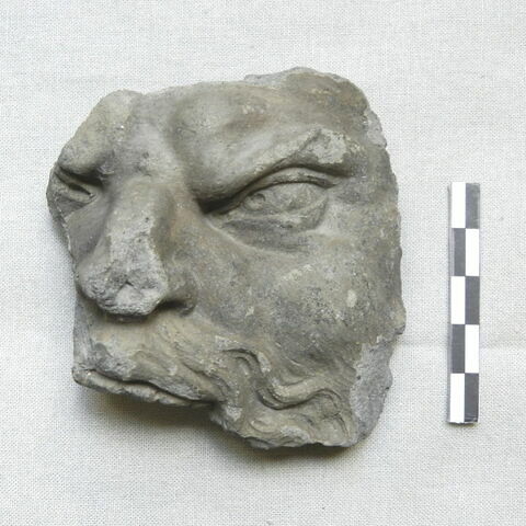 Fragment de visage moustachu
