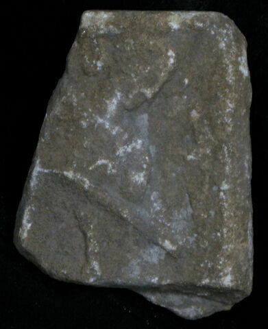 Stèle votive à Saturne (fragment)