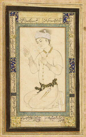 Jeune homme tenant un livre et un brin de narcisse, image 2/12