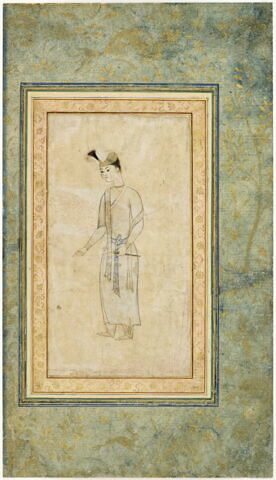 Jeune indien vêtu d'une robe et tenant un fuseau (page d'album)
