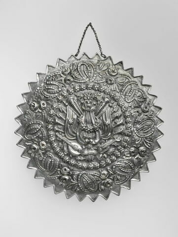 Miroir circulaire à décor de trophée