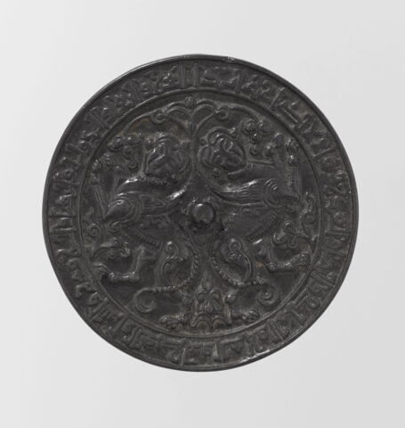 Miroir aux deux sphinx adossés