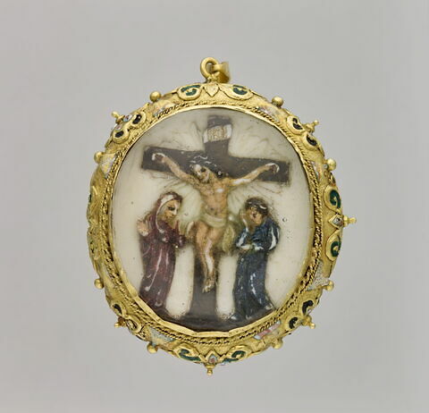 Médaillon ovale en ivoire polychromé : Crucifixion et Vierge à l'Enfant