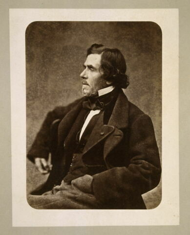Portrait de Delacroix assis, la main gauche dans la poche du pantalon