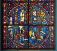 Vitrail, médaillon inférieur : scènes de l'histoire de saint Nicaise avec saint Nicaise et sainte Eutropie se dirigeant vers la cathédrale de Reims, arrivée des Vandales, martyre de saint Nicaise, image 1/17