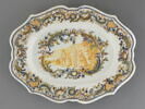 Plat ovale à décor polychrome, image 1/2