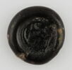 Disque orné d'un signe mystérieux, image 1/2
